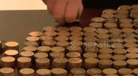 Man uses £20,000 worth of coins to pay for two cars