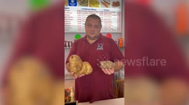 *NEW VIDEO* Chip shop finds massive potato - enough for two whole portions