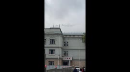 Stunning distant view of pavilion shrouded in clouds like mirage in China