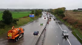 Saturday 7th October 2023.Heavy rain causes flooding of the M9 Motorway near Stirling, Scotland, UK. 4K.