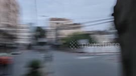 Scenes from the bombing of the Tower of Palestine in the central Gaza Strip