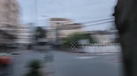 Scenes from the bombing of the Tower of Palestine in the central Gaza Strip