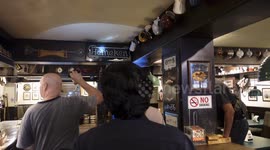 Snake in a Bar in Thailand scares Staff and entertains  Customers as it is captured