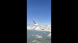 Unexpected! Another plane was recorded passing through the window of my plane