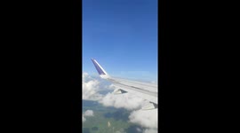 Unexpected! Another plane was recorded passing through the window of my plane