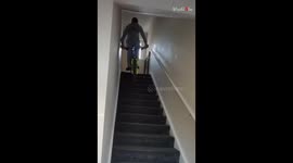 Guy falls hard when he bravely tries to cycle down the stairs *Hilarious Fail*