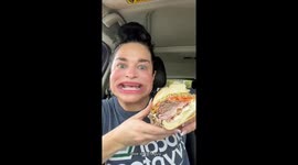 This is how woman with world's BIGGEST mouth eats a sandwich
