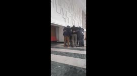 Two two división unified champions Terence Crawford Prays witt his team before going into court to support Bomac sentencing.