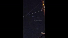 Rocketship flying over the city of Los Angeles CA on 10/8 at 12:46am
