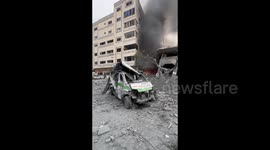 Rescue teams work to pull survivors out of rubble following Israeli airstrikes on Gaza