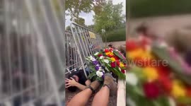 Mourners Take Cover Amid Missile Barrage in Israel