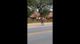 Skateboarding Spiderman comes to the rescue after biker's tumble in West Lafayette
