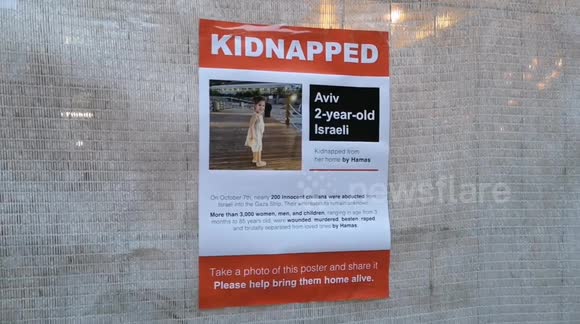 Posters of Israelis taken hostage by Hamas plastered onto London street