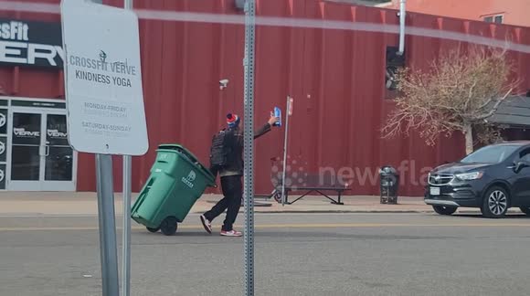 Caught a guy walking a trashcan that clearly wasn't his.