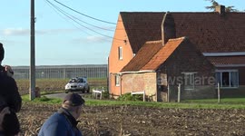 Sometimes you are lucky, and sometimes you are very lucky. Rally car goes around, avoids the canal, turns around a pole and ends up on the driveway