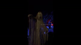 Beauty and the beast ! Watch this blonde ghost wailing at the cemetery gates for Halloween