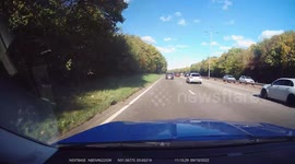 White car overtaking on the near and far side by cutting across multiple cars - driver disqualified