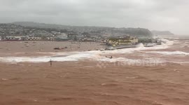 Devon town battered by waves as Storm Babet makes landfall