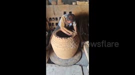 Man Makes A Clay Pot by Hand in Jinan, Shandong, China