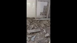 in Al-Maghazi camp in the center of the Gaza Strip after Israeli occupation aircraft bombed an UNRWA school housing displaced people. Dozens of martyrs and wounded.