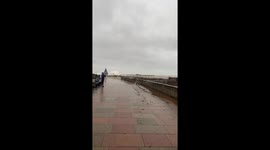 UK weather Storm Babet waves crash into Teignmouth, Devon, UK