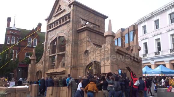 Volunteers help artist recreate 25m-high Ipswich monument in just cardboard and tape