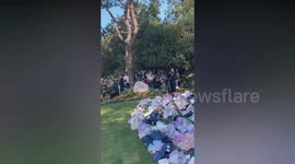 Hong Kong-American pop star Coco Lee buried in front of tearful relatives