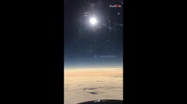 Space scientist basks in the glory of Total Solar Eclipse from an airplane 36,000 feet above the Pacific
