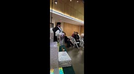 Bride's cousin slips over during wedding aisle walk