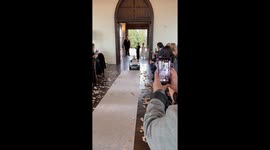 9-month-old flower girl drives down wedding aisle on remote control baby Maserati