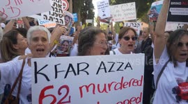 Residents of Kfar Aza protest outside the ministry of Defense in Tel Aviv, Israel calling to release the hostages held in Gaza