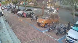 Lorry spills its cargo when it hits low-hanging tree branch in China