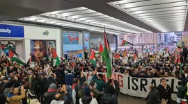 GIANT FREE PALESTINE  protest fills markets street from top to bottom. In Manchester, England