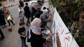 Jordanian artists draw paintings in solidarity with Palestinians