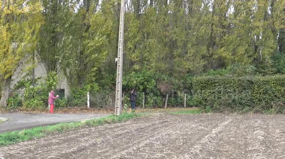 Rally car skids at high speed. The pilot has a guardian angel with him and lands in the field with a crash.