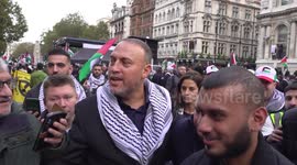 Palestinian Ambassador surrounded by supporters amid protest in London, UK