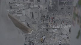 Palestinians Pick Up Pieces After Air Raids in Gaza