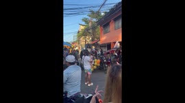 Trick-or-treater dresses up as corpse in coffin and parades around streets for Halloween