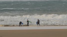 Surfers brave choppy seas as Storm Ciaran makes landfall in Cornwall