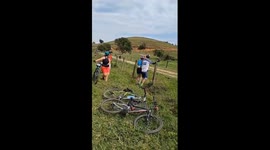 Ox charges biker and cyclists in startling encounter