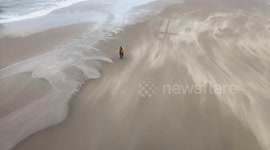 Storm Ciarán's gale sweeps Scheveningen Pier, storm chaser spotted