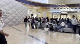 Unathorized Free Palestine Protestors March through Southpark Mall in Charlotte NC, as a Team of Security Guards Escort Them Out of Mall.