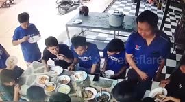 Cheeky colleague steals egg from friend's plate without him noticing in lunchtime prank