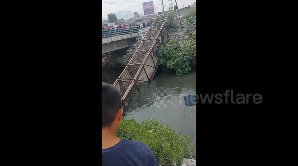 Terrifying Moment Pedestrian Bridge Collapses Into River During Terrifying Moment Pedestrian Bridge Collapses Into River During