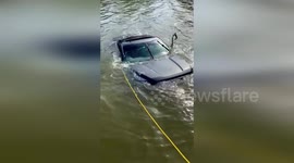 SUV Plunges into Waters as Firefighters and Divers Spring into Action in Naples, FL, USA