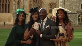 Eniola Aluko and Johnny Nelson receive awards at Windsor Castle, UK