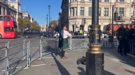 Scottish backpiper plays ‘Flower of Scotland’ at Parliament Square on Armistice Day