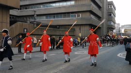 The new Lord Mayor of London was followed by a protestor in a Guy Fawkes mask