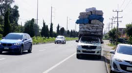 Pickup Truck with a High Load in northern Thailand