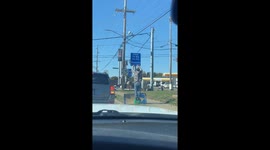 Panhandler Corrects Sign In Front Of Police